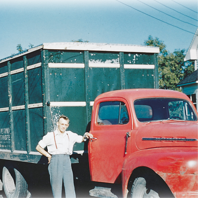 Anton Kehler delivering school supplies to Steinbach, Manitoba, 1955