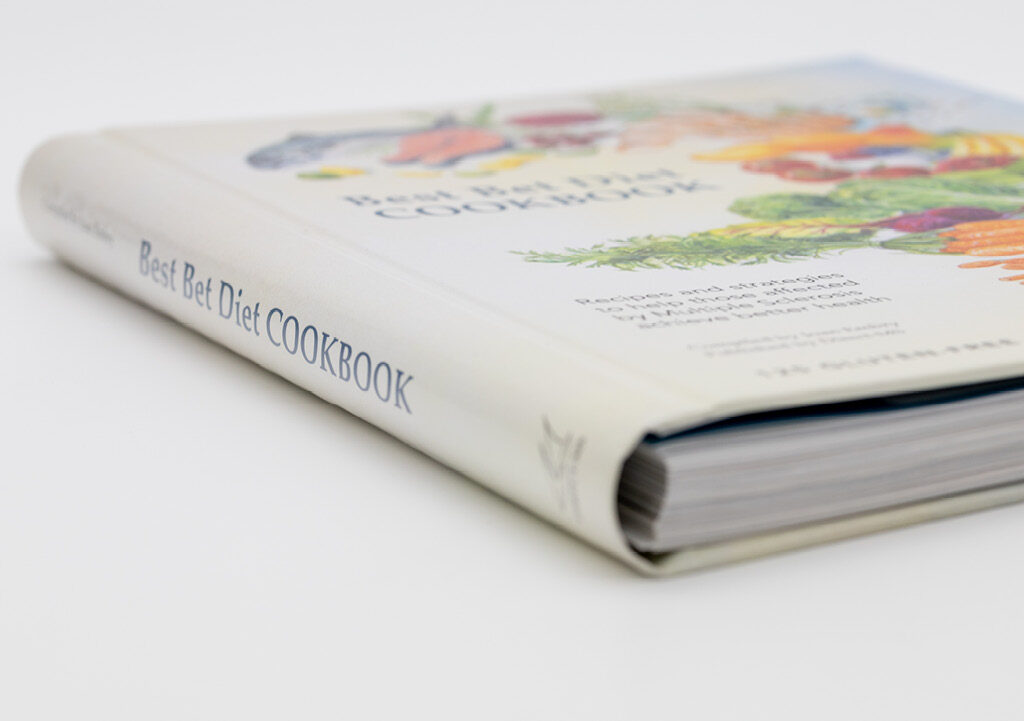 Cookbook showing concealed wire-o binding with hidden coil inside the hardcover spine