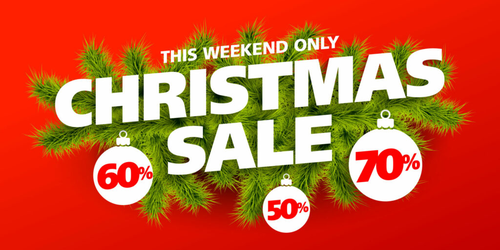 Red Christmas sale graphic with pine branches and ornaments showing 50%, 60%, and 70% discounts