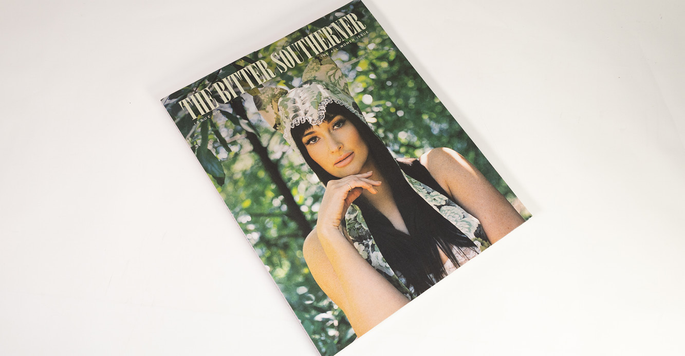 Cover of The Bitter Southerner magazine featuring a person outdoors among leafy green trees