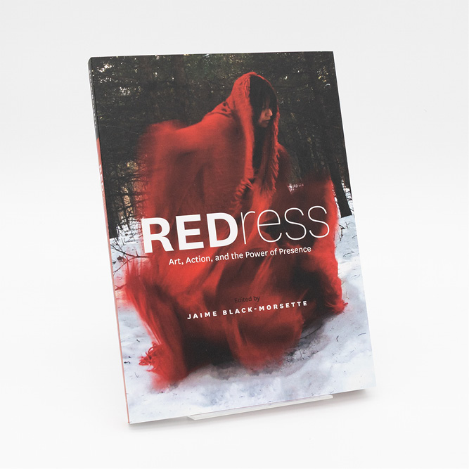Cover of the book REDress: Art, Action, and the Power of Presence, featuring a flowing red dress figure set against a snowy forest background.