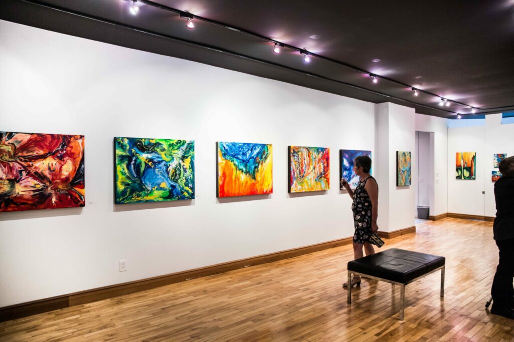 Gallery in the Park Exhibit Hall with colourful artwork on the wall