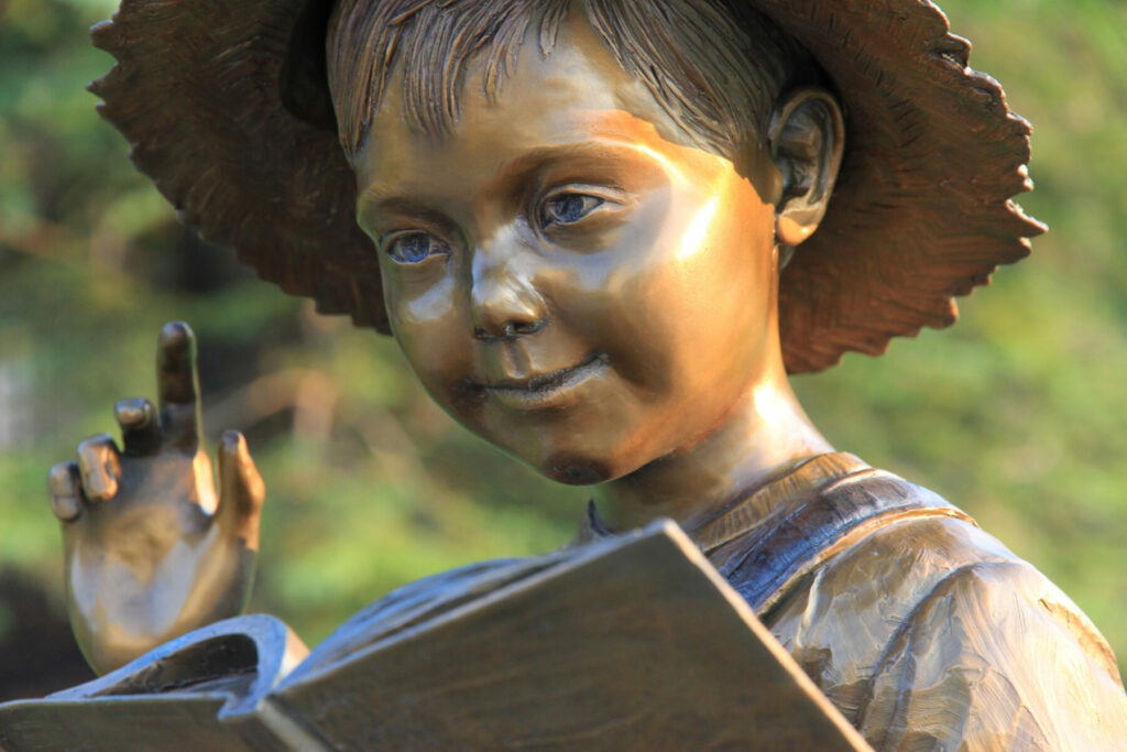 A closeup of the Gregory Johnson sculpture "Jack's Story Time"